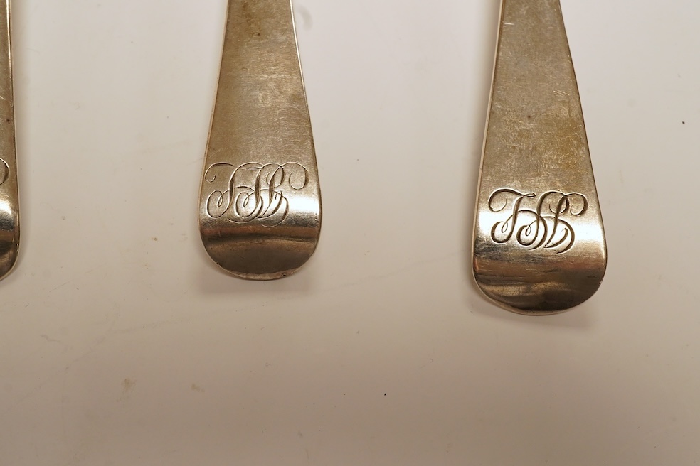 A set of six George III provincial silver table spoons by William Welch II, Exeter, 1807/8 & 1810, with engraved initials, 23cm, 12oz. Condition - fair to good